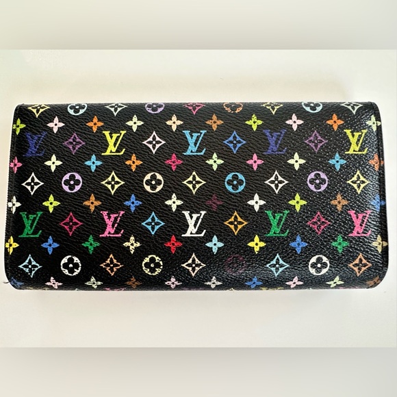 Authentic Louis Vuitton Monogram Multicolor Sarah Wallet
Pre loved - Picture 3 of 12